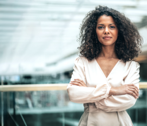 Woman standing confidently with her arms crossed